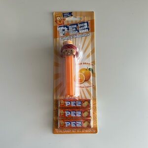 PEZ LIMITED EDITION TEAM ORANGE PRESENTER GIRL - NEW ON CARD - RETIRED